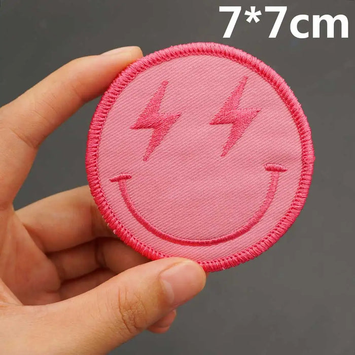 Funny Emoji 'Pink Smiley with Lightning Eyes' Embroidered Patch