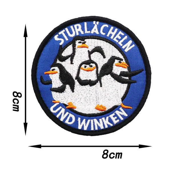 Penguins of Madagascar 'Sturlacheln Und Winken' Embroidered Patch