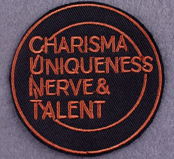 Quote 'Charisma Uniqueness Nerve And Talent' Embroidered Patch