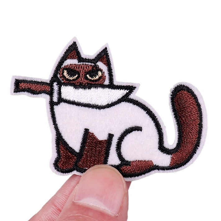 Brown White Cat 'Knife In Mouth | Staring' Embroidered Patch